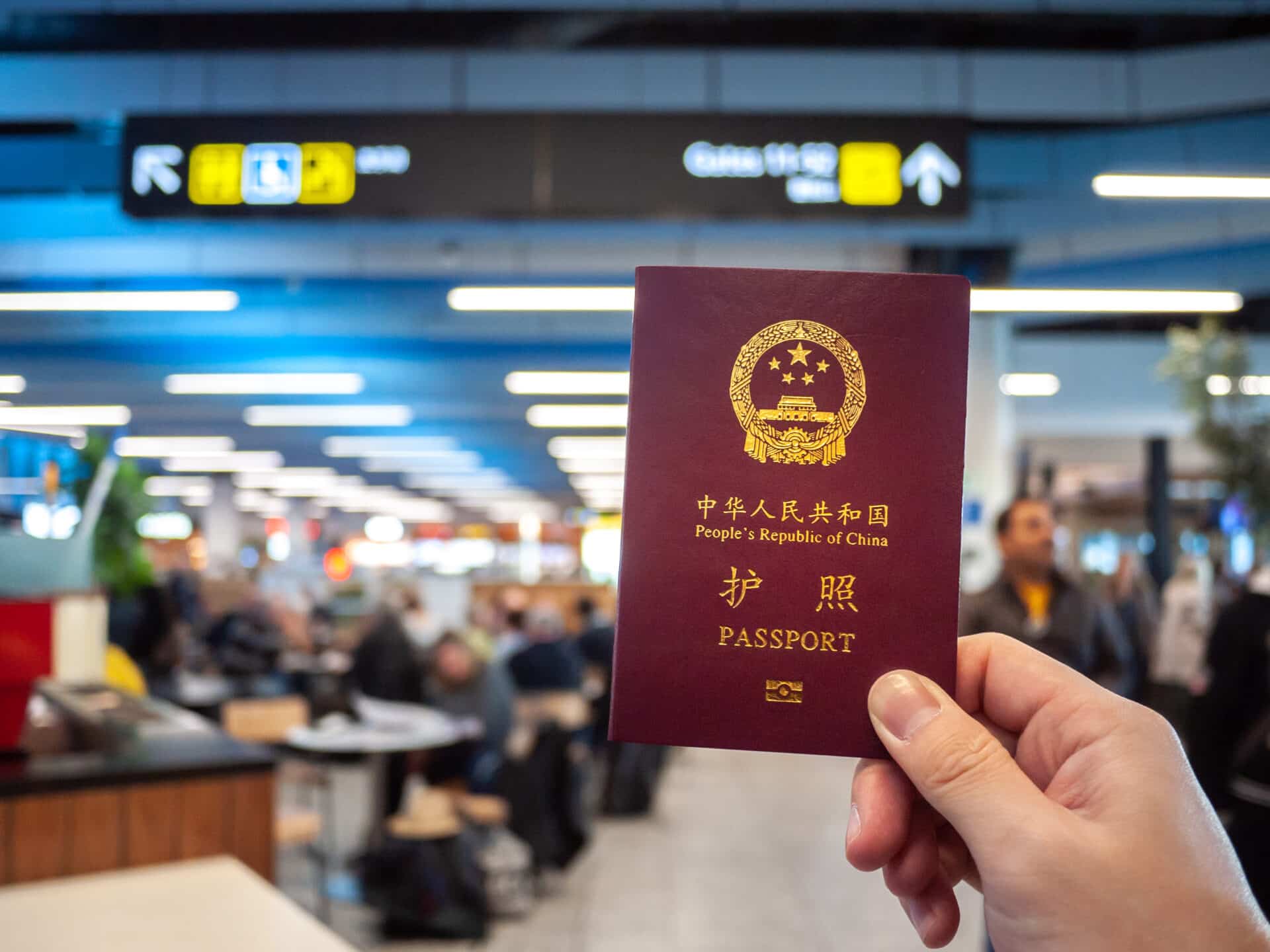 Person holding a Chinese passport