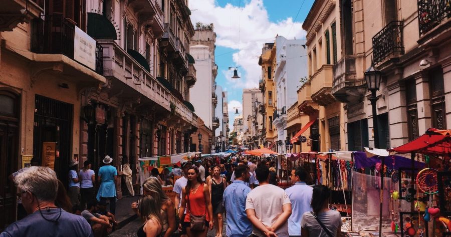 A solo traveller walking through European town