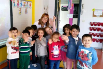 A TEFL teacher using a brain break to keep her students engaged