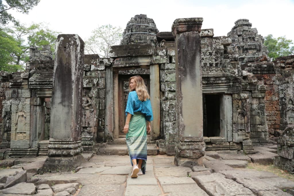 A solo traveller exploring  Angkor Wat in Cambodia