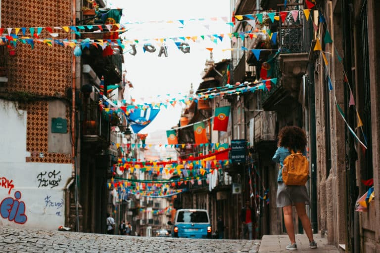 Traveller using a phone translation app in a foreign city