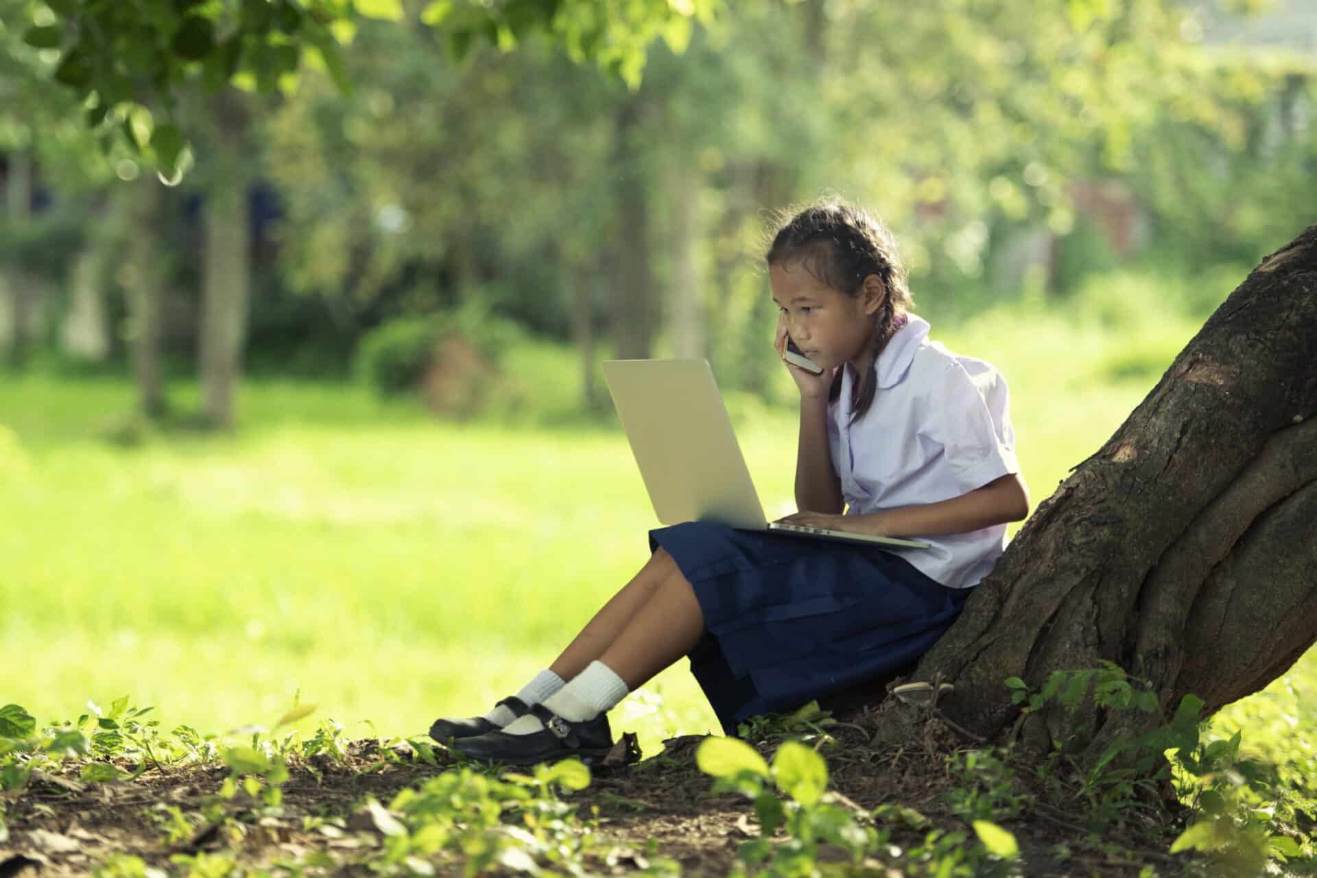 Girl learner with a laptop