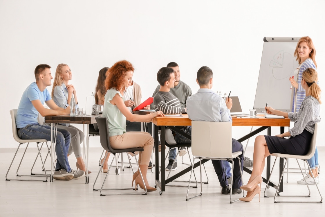 TEFL trainer standing at whiteboard