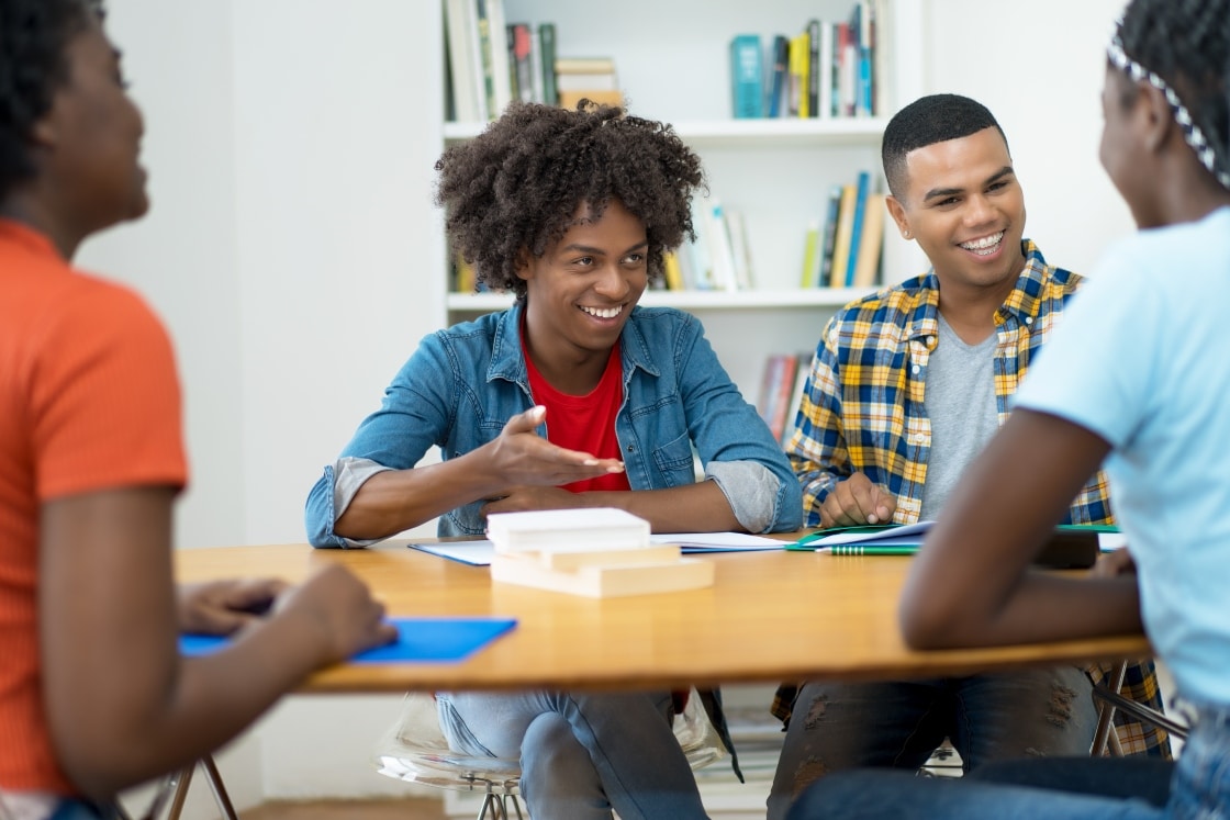 Students with good rapport in the EFL classroom laughing with each other.