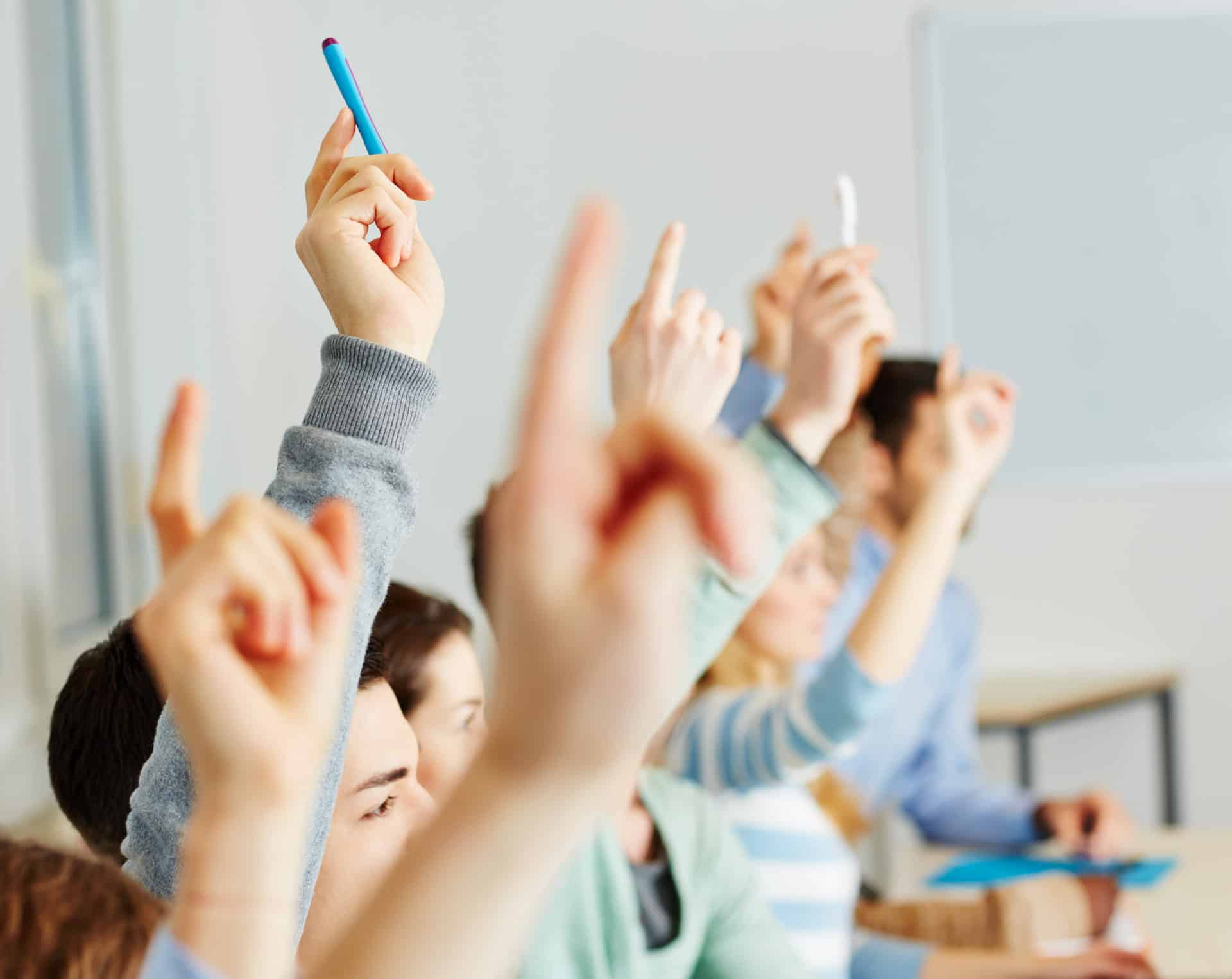 students asking questions in the EFL classroom