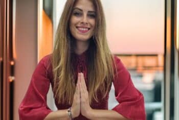 Teacher Timea showing a traditional Vietnamese greeting