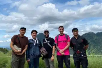 Colleagues standing together in the countryside of Jakarta, Indonesia