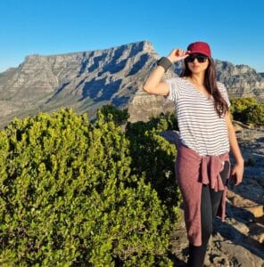 Teacher Yasmien hiking in the mountains