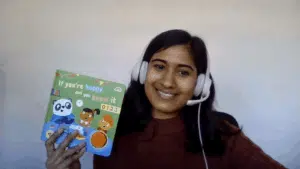 Teacher Tasmika holding some teaching resources