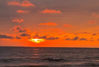 A sunset at the beach in Bali