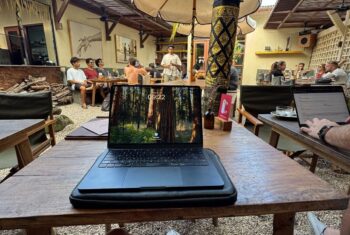 A laptop of a digital nomad in a cafe in Bali