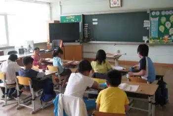 Students practising English speaking skills during a conversation lesson in South Korea