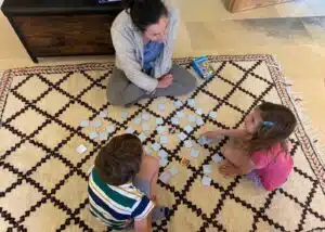 Teacher Rebekah playing a game with her Young Learner students