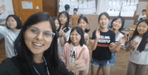 Teacher delivering an English lesson in an international classroom