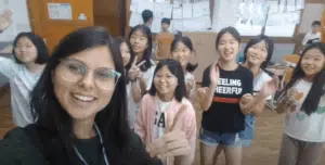 Teacher delivering an English lesson in an international classroom