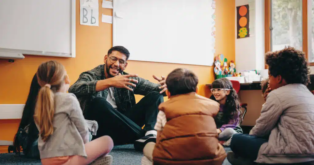 TEFL teacher guiding students through a teachable moment