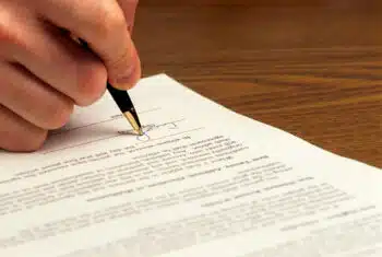 A person signing a contract