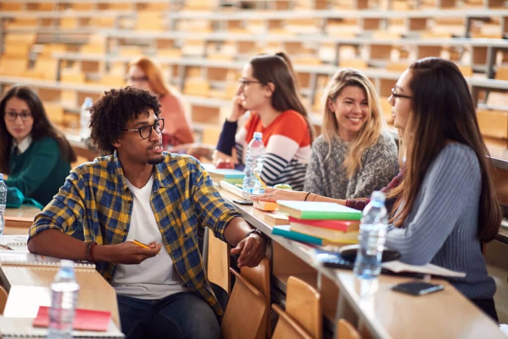 EFL/ESL students talking in a classroom - high STT